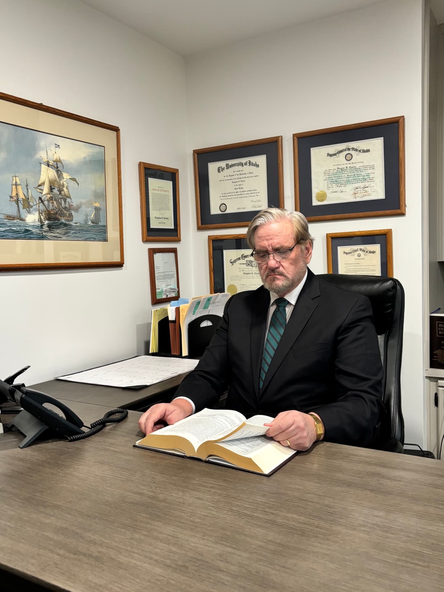 Douglas D. Emery, Attorney at Law, at his desk in Twin Falls, Idaho office